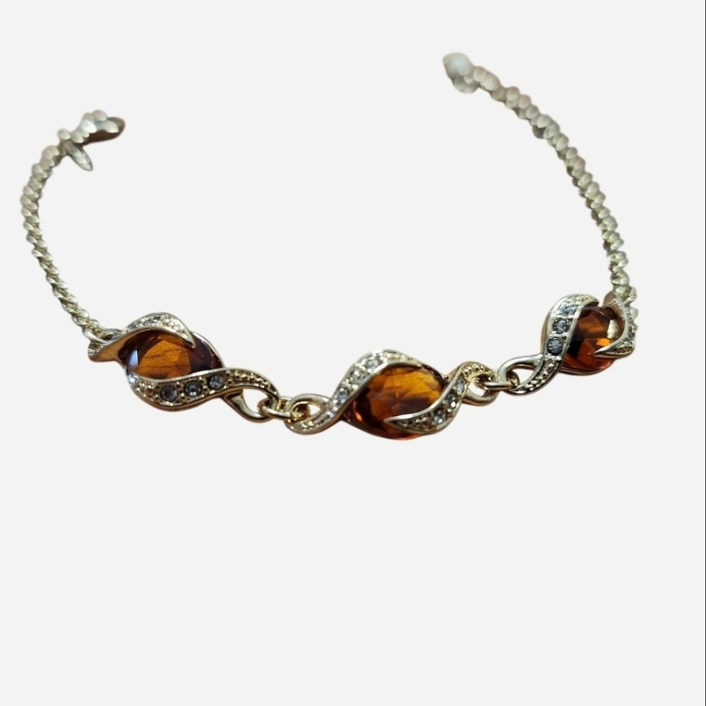 Swarovski Elegant Gold Tone and Clear Amber Stone Bracelet